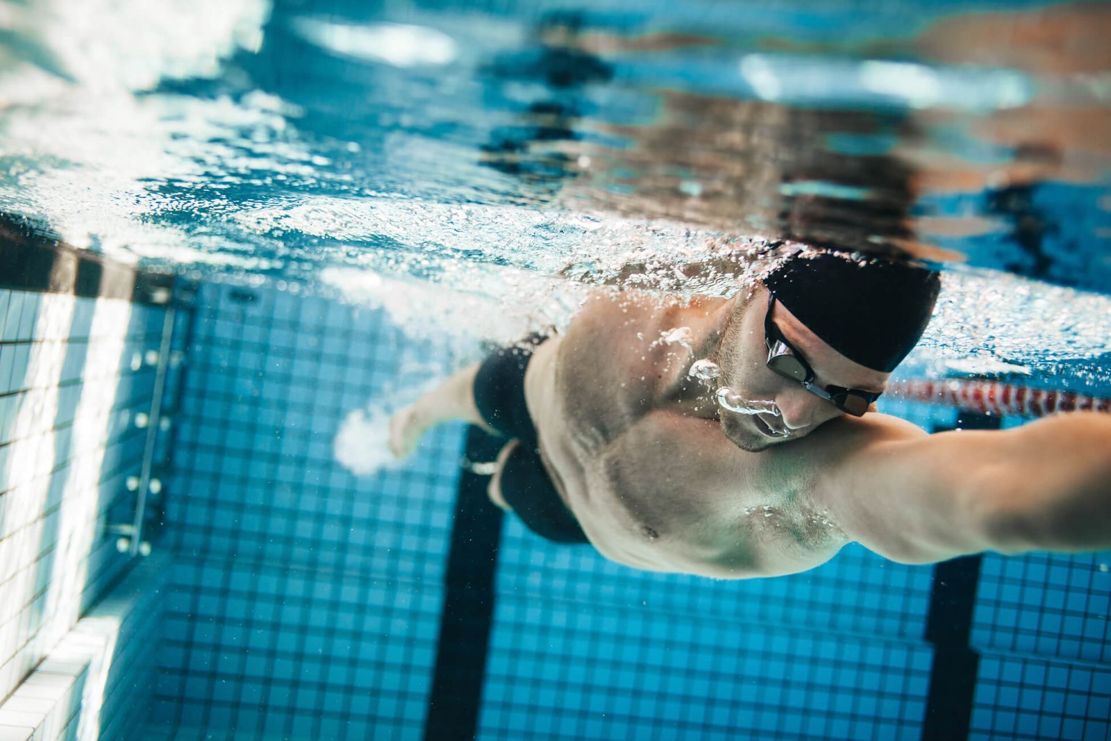 fit-swimmer-training-in-the-swimming-pool-2022-02-02-05-05-55-utc-3 coaching session